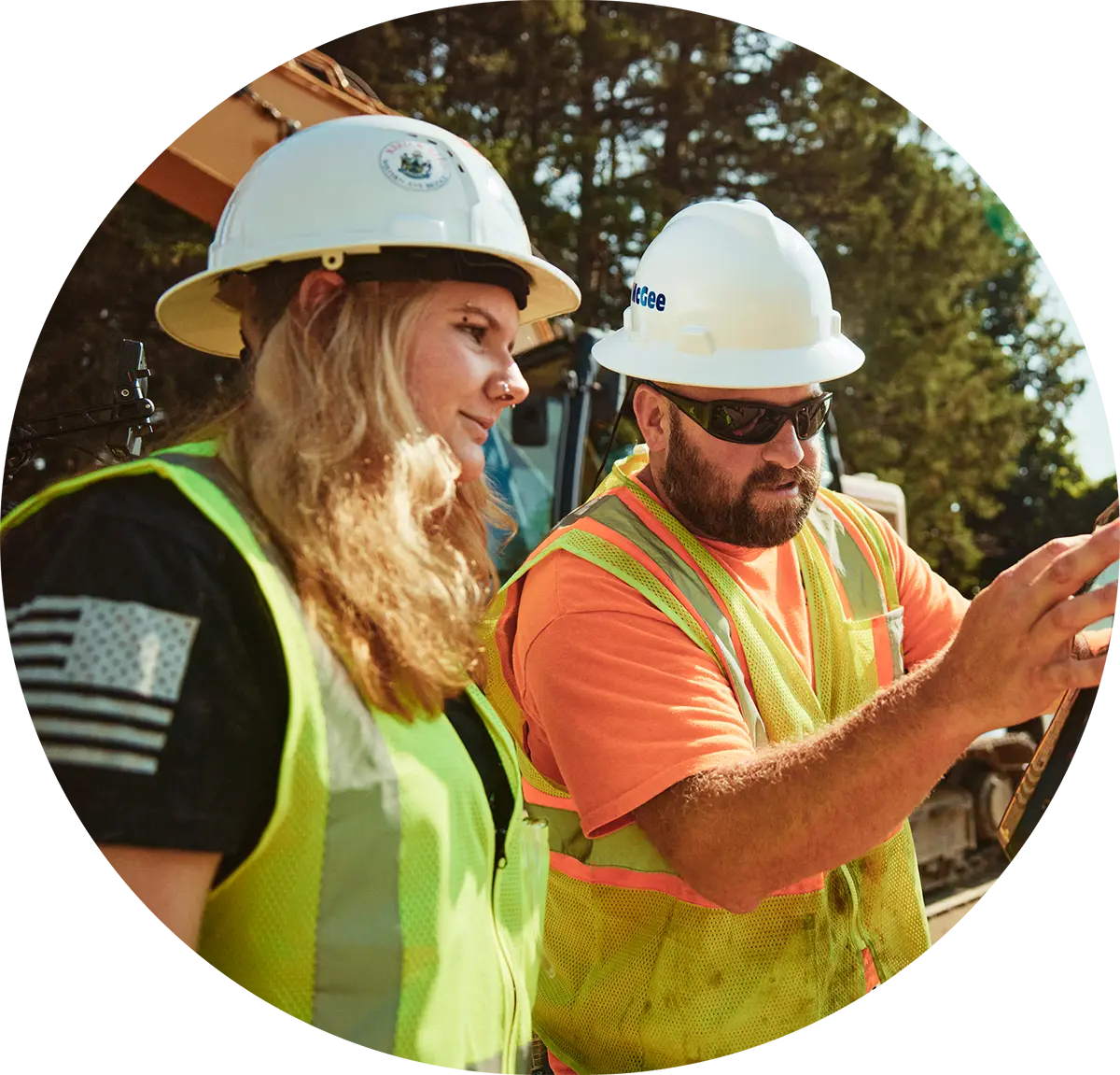 man and woman working on the job
